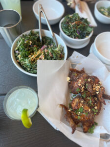 chicken wings and kale salad